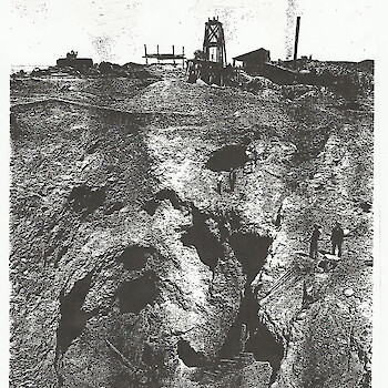 Quitovac Glory Hole within the Quitovac Mine working area from circa 1900. Note labyrinth of tunnels exploiting areas north of the open hole. At least 3 shafts and part of a mill are visible in the photograph