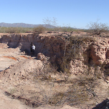 Old mill tailings pile on south side of Quitovac pueblo